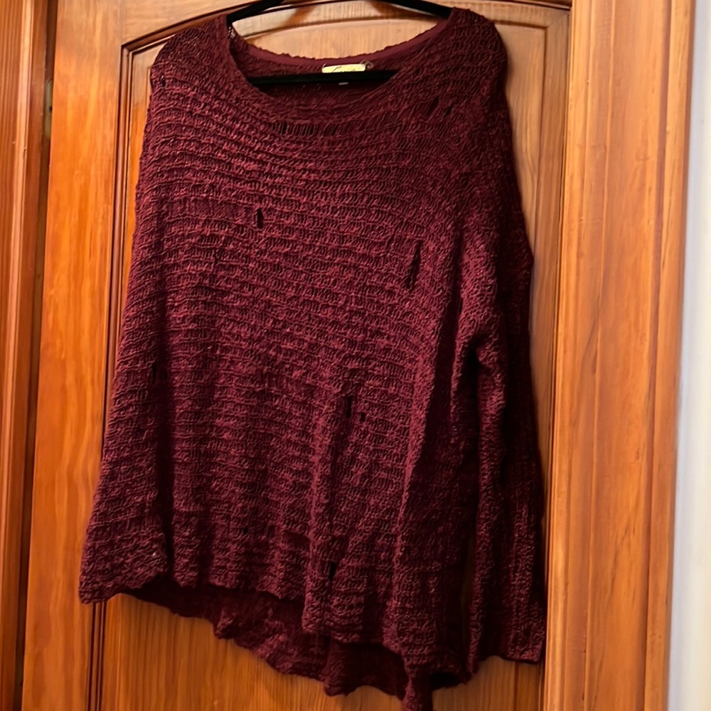 Trendy maroon/wine color sweater, holes are intentional, size large